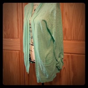 Seafoam green cardigan.